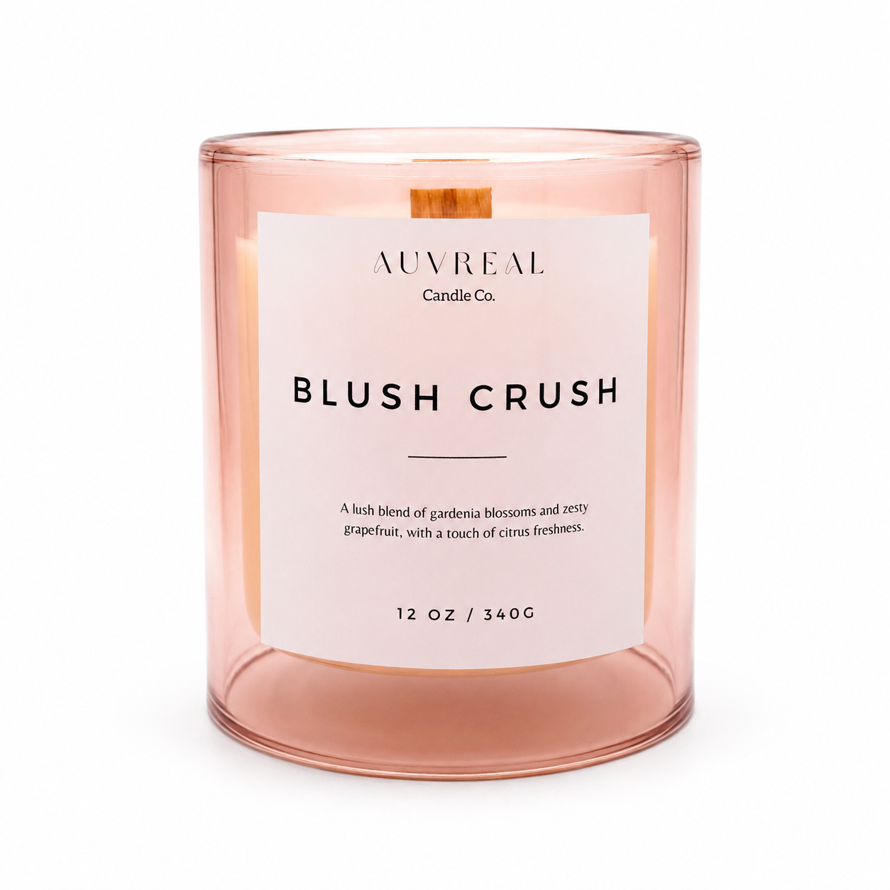 Pink candle with 'AUVREAL Candle Co' label on a white background