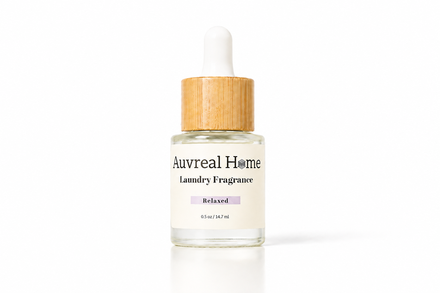 Auvreal Home laundry fragrance bottle with wooden cap on a white background