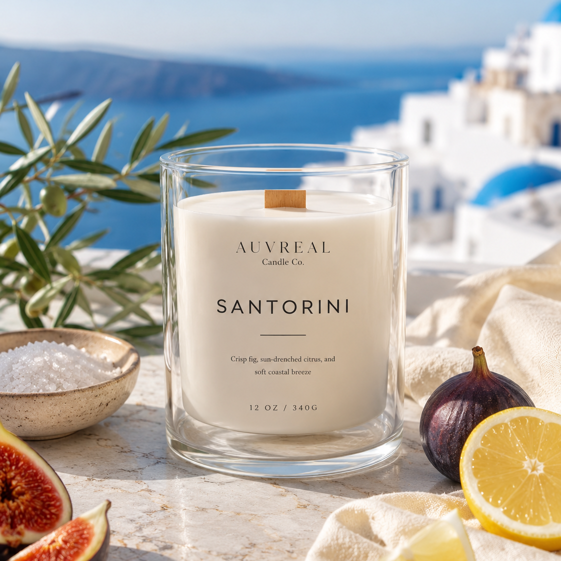 Santorini candle by Auveal Candle Co. with scenic background